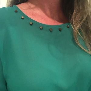 Emerald green top. slightly sheer, long sleeve.